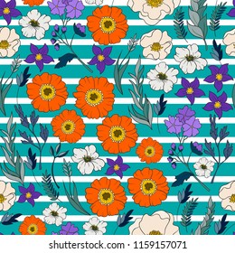 Ditsy seamless pattern with wild flowers and leaves. 