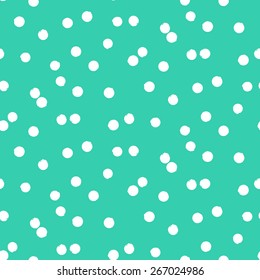 Ditsy vector polka dot pattern with scattered hand drawn small circles in aqua green and white colors. Seamless texture in vintage 1960s fashion style. Modern hipster background with round shapes