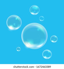 Dive into our realistic water bubble set! Reflective bubbles on a blue background, ideal for adding depth and realism to designs, aquatic-themed projects, and creative graphics