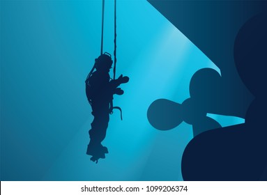 Diver inspects a propeller under water