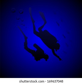 Divers in a deep immersion