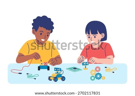Diverse children working together to build and program small robots