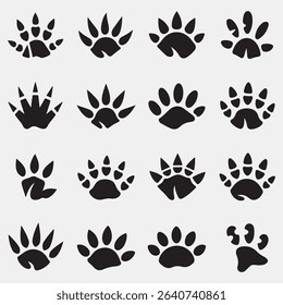 Diverse collection of black animal paw prints silhouettes with various claw and pad designs