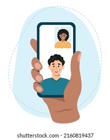 Diverse couple's video call. Hand holding a smartphone with active conversation on a touch screen. Two young people chatting remotely with a camera. Vector illustration for dating app or web business
