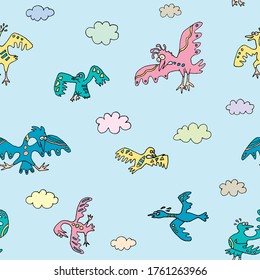 Diverse, funny and colorful birds fly and tumble among light clouds. Seamless pattern, vector.