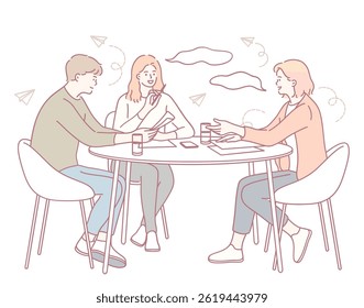 Um grupo diversificado brainstorming ideias em um ambiente de trabalho moderno, promovendo a criatividade e o trabalho em equipe.