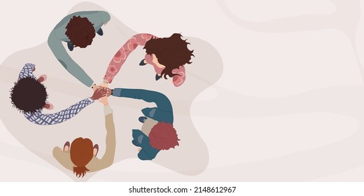 Diverse And Multicultural People In A Circle With Hands On Top Of Each Other. Top View. Diversity People. Racial Equality. Concept Of Teamwork Community And Cooperation.Diverse Culture