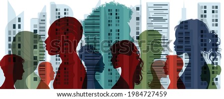 Diverse multiethnic and multicultural people.Concept of society and diversity.Integration coexistence and harmony of peoples.Population of diverse culture.City and Buildings background