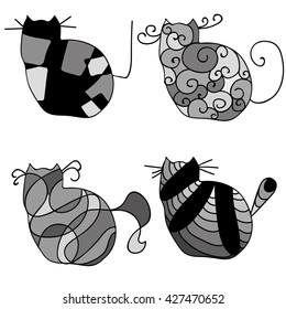 a diverse set of black and white cats