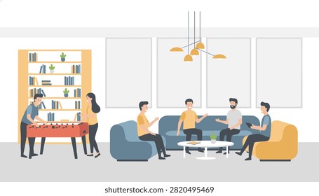 Diverse team of creative colleagues enjoying office leisure time playing table football and chatting in a modern lounge.