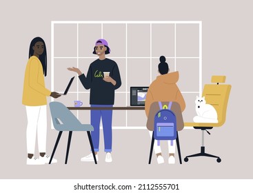 A diverse team of young adults working in the office, millenials at work