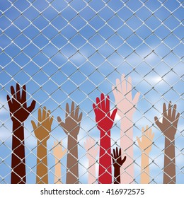 Diversity hand silhouettes behind metal wire fence against blurry sky background.