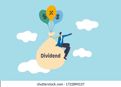 Dividend Stock investment return in financial crisis COVID-19 Coronavirus crash concept, happy businessman stock investor sitting on money bag with the word dividend floating with dollar sign balloons