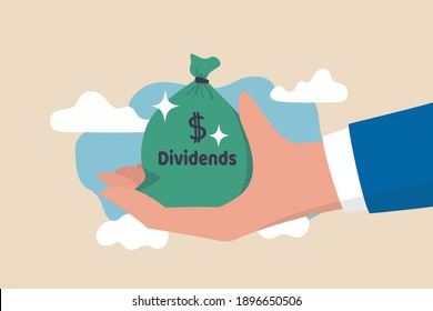 Dividend stocks, public company payback profit in stock market, return or profit from investment concept, businessman investor hand holding big money bag with label Dividends and dollar money sign.