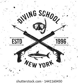 Diving school vector emblem with two crossed spearguns on background with removable grunge textures