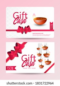 Diwali gift voucher set with different discount & offers and realistic illuminated oil lamps for Diwali festival celebration.