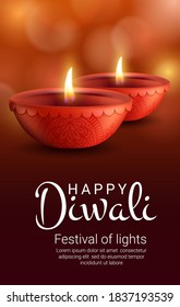 Diya lamps of Indian Diwali light festival, vector Hindu religion. Deepavali holiday oil lamps or candle lantern in clay cups with burning flames, religious rangoli decoration and paisley ornaments