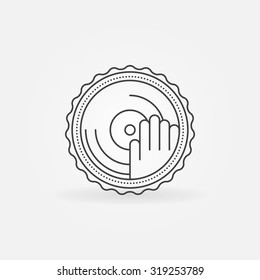 DJ label or badge - vector symbol of a hand playing on a vinyl, DJ music logo concept