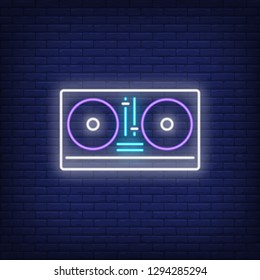 DJ mixer neon sign. Luminous signboard with turntable. Night bright advertisement. Vector illustration in neon style for party, entertainment, music