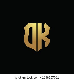 DK logo monogram with gold colors and shield shape design template