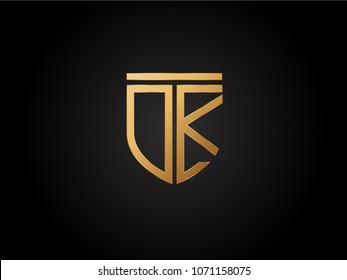 DK shield shape Letter Design in gold color
