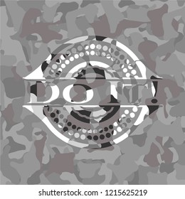 Do It! written on a grey camouflage texture