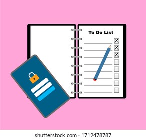 To Do List in a notebook with smartphone on a table.