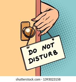 Do Not Disturb Woman Hand Hangs A Sign On The Door. Comic Cartoon Pop Art Vector Retro Vintage Drawing