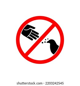Do Not Feed Sign or Do Not Feed Symbol Vector On White Background. Do not feed the birds warning sign, stylized vector pigeon silhouette and hand symbol in crossed red circle.