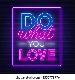 Do what you love neon lettering on brick wall background.