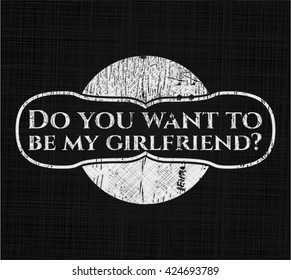 Do you want to be my girlfriend? written on a blackboard