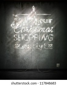 Do your Christmas shopping early, neon sign over old wall. Vector Illustration.