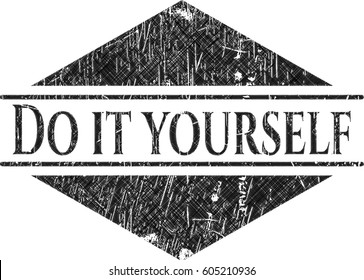 Do it yourself chalk emblem written on a blackboard
