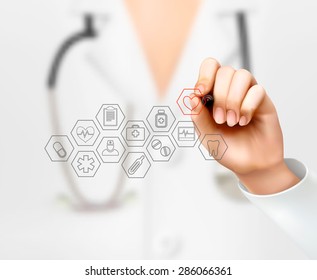 Doctor drawing medical icons. Concept of health. Vector.