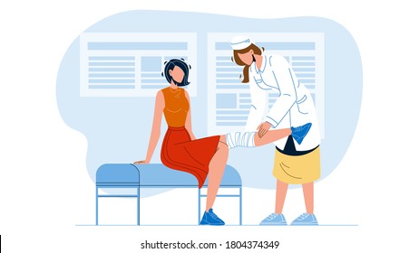 Doctor Giving Physiotherapy To Patient Vector. Nurse Bandaging Leg With Elastic Bandage, Medical Physiotherapy. Characters Physical Therapy In Hospital Cabinet Flat Cartoon Illustration