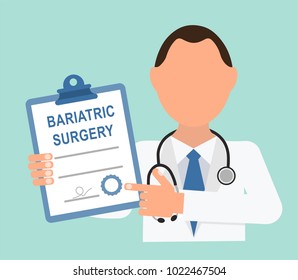 The doctor holds a document with an inscription in his hands. BARIATRIC SURGERY.