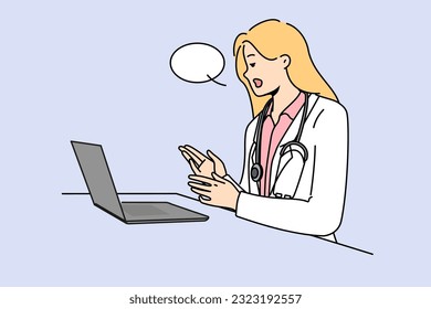 Doctor with laptop provides telemedicine services by consulting patients via internet. Woman telemedicine specialist in white remotely examines patient and gives recommendations for treatment