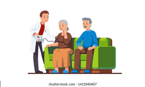 Doctor Or Nurse Visiting Elderly People Family Couple And Measuring Blood Pressure Of Woman. Old Grandmother Receiving Help & Care In Monitoring Her Health At Home. Flat Vector Character Illustration