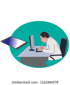 doctor sitting at his desk in front of a computer