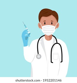 A doctor with a syringe in his hands. The concept of vaccination