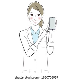 A doctor woman smiling showing a smartphone