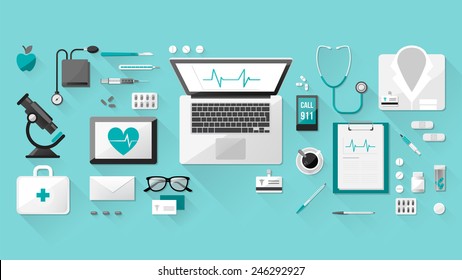 Doctor's Desktop With Medical Healthcare Tools And Equipment, Laptop, Tablet And Phone