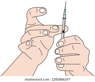 Doctor's hand expelling air bubbles in syringe