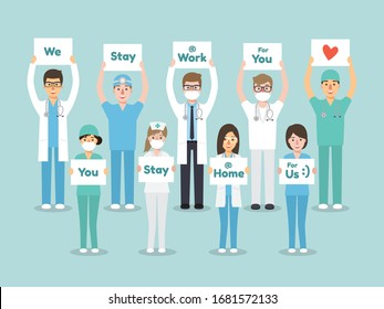 Doctors, nurses and medical staff holding poster requesting people avoid Coronavirus and Covid-19 spreading by staying at home. Coronavirus Disease awareness.