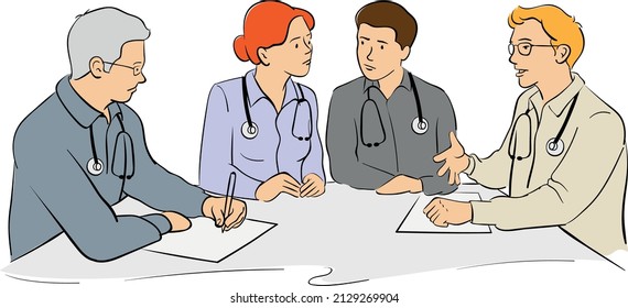 Doctors sitting at the table having a meeting among themselves