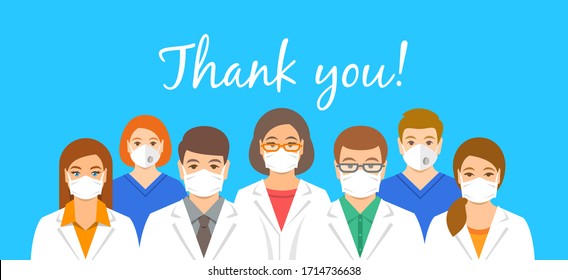Doctors team in protective face masks with thank you inscription. Appreciation for hospital staff fighting the spread of coronavirus. Personnel of medical clinic, physicians and nurses stand together