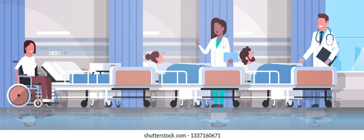 doctors team visiting disabled mix race patients sitting wheelchair lying bed intensive therapy ward healthcare concept hospital clinic room interior horizontal