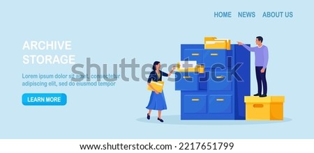 Document archiving and storage. Business people search files in archives. Support service, database. Men working with information, documents and statistics in analytical department. Folder in archive