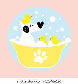 dog bathing with rubber duck