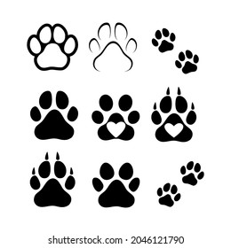Huellas de perros o gatos. Silueta aislada de vectores